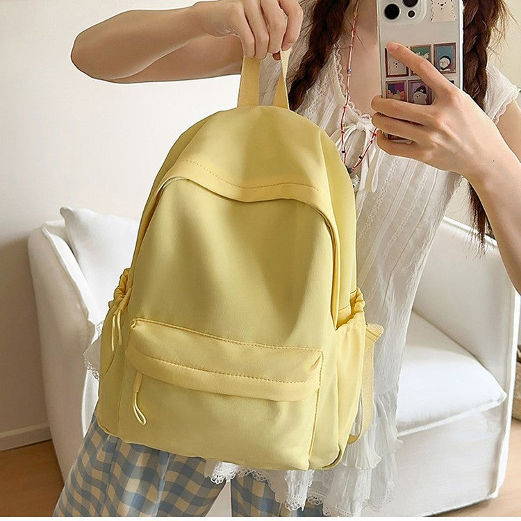 Casual Backpack with Flexible Side Pockets and Organized Structure