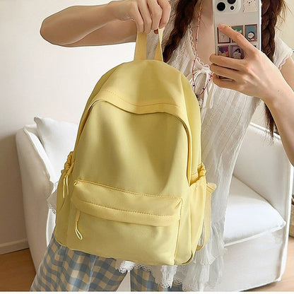 Casual Backpack with Flexible Side Pockets and Organized Structure