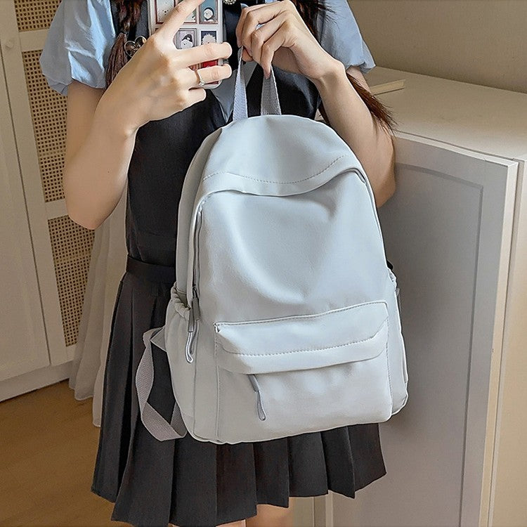 Casual Backpack with Flexible Side Pockets and Organized Structure