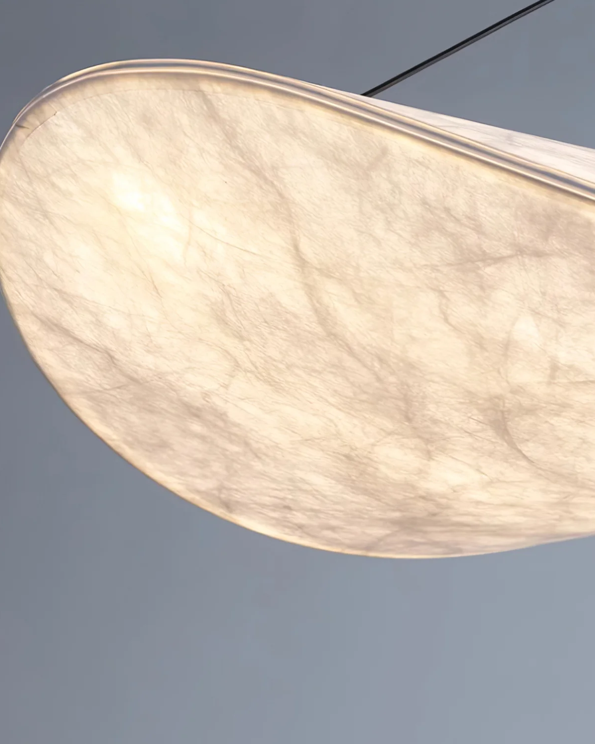 Japandi Style Ribbon Pendant Light with Eclipse Illumination