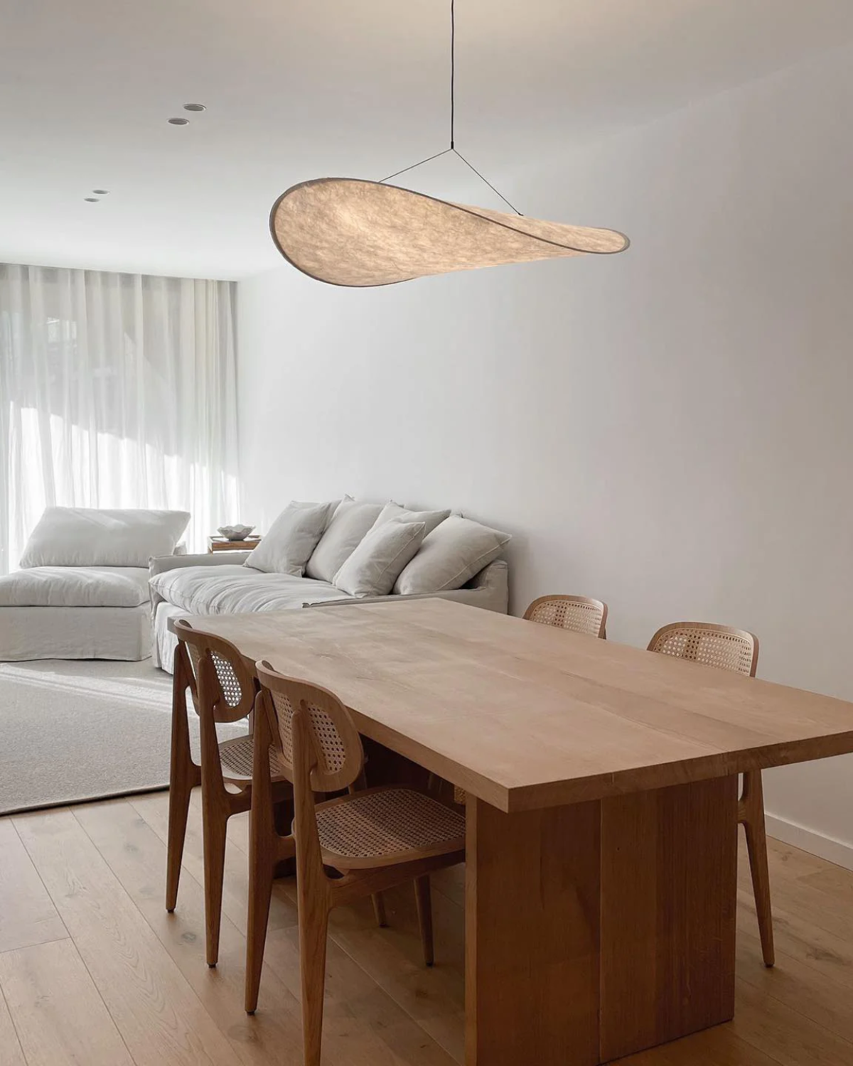 Japandi Style Ribbon Pendant Light with Eclipse Illumination