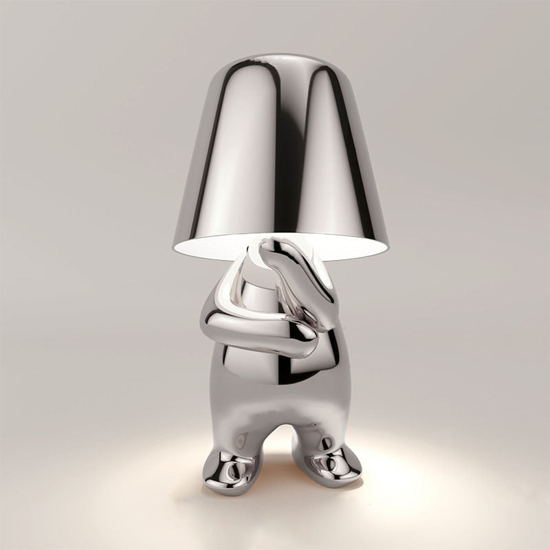 Table lamp with timeless design and gentle light emission