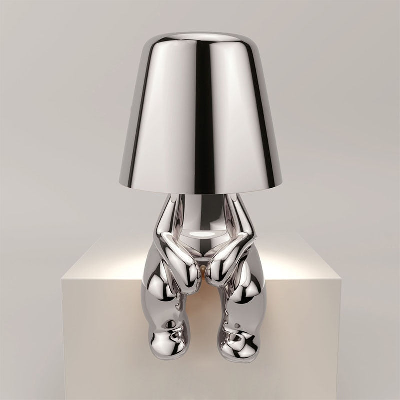 Table lamp with timeless design and gentle light emission