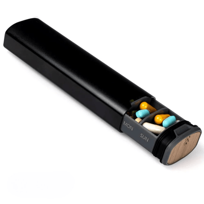 TRAVEMED – Travel-friendly pill organizer with 7 compartments